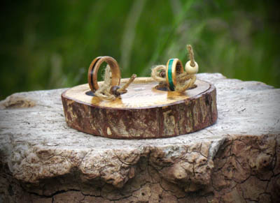 wooden wedding rings on a Oak bearer