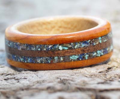 Shells and gemstones in a wooden ring