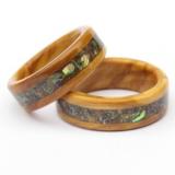 Strong and durable wooden rings inlayed with abalone shell perfect for a 5th anniversary