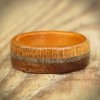 Wooden wedding ring with sand